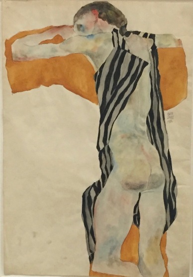Egon Schiele, Liegender Mädchenakt in gestreiftem Kittel, 1911 - Privatsammlung Wien ©starkandart.com